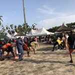parents engaging in a tug of war game show at the asaba fun fair held at the Nelson mandela gardens and resorts